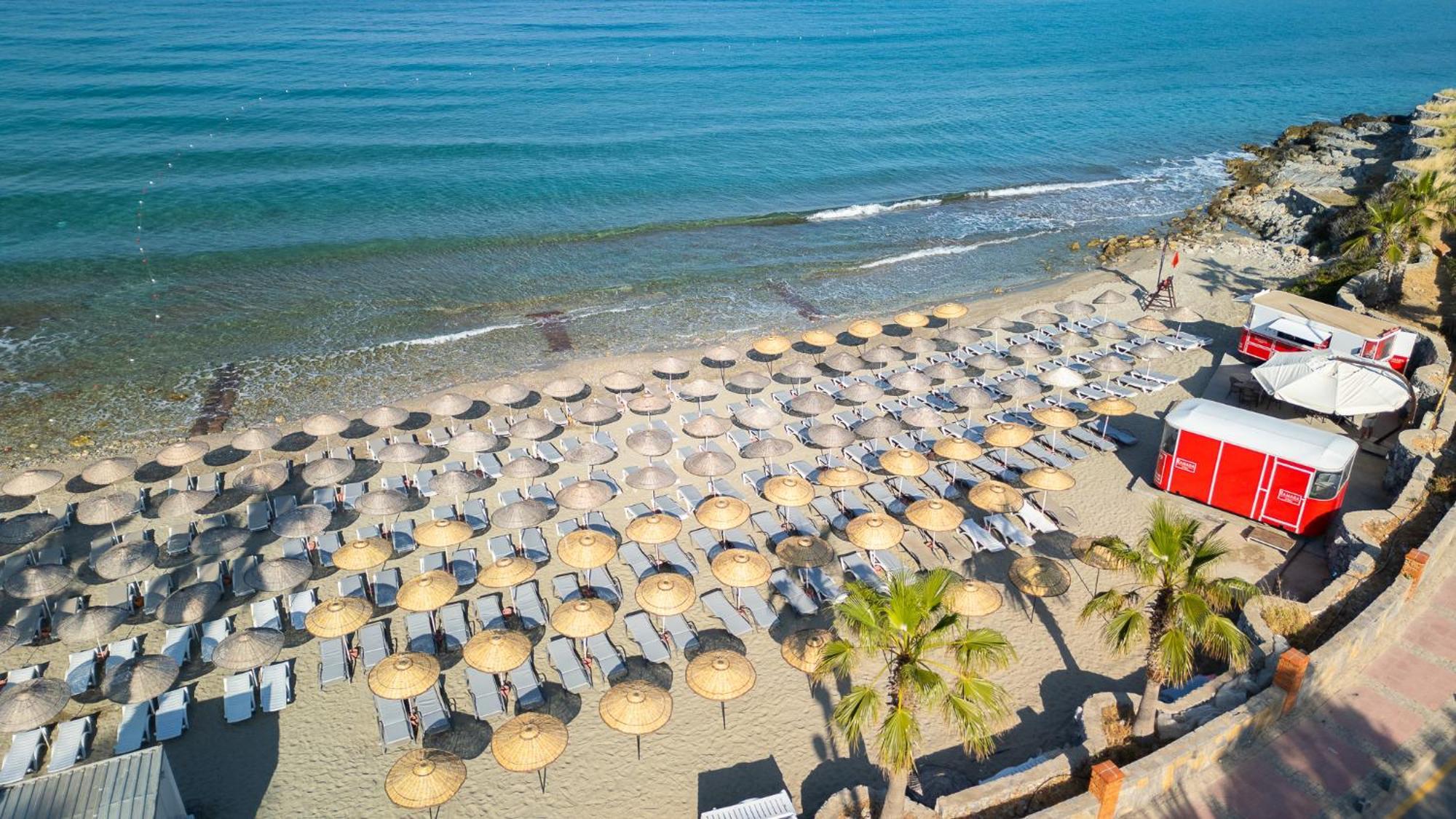 库萨达斯华美达高尔夫酒店 外观 照片 The beach of the hotel