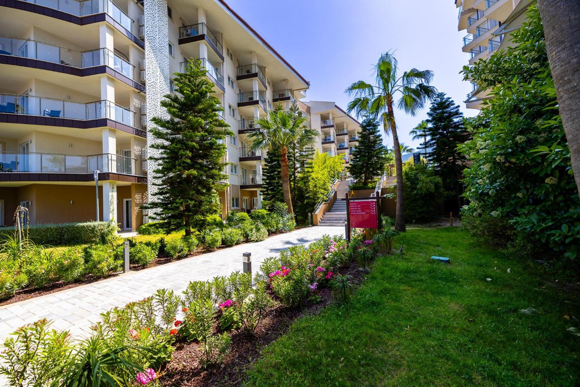 库萨达斯华美达高尔夫酒店 外观 照片 Residential complex in Antalya